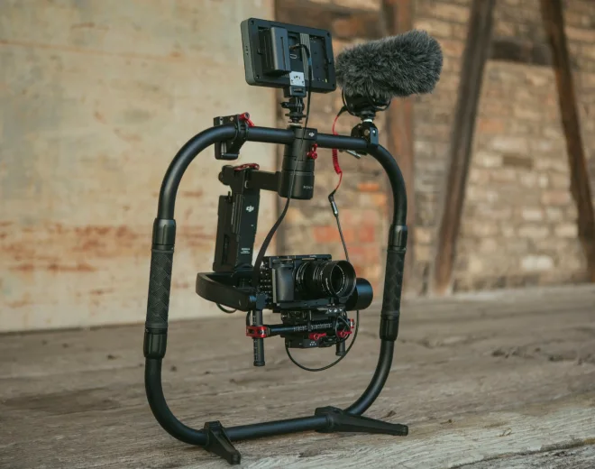 Camera on pedestal, checking height and balance